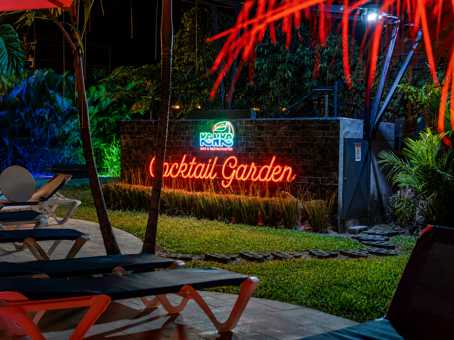 Kenko Cocktail Garden neon sign glowing at night